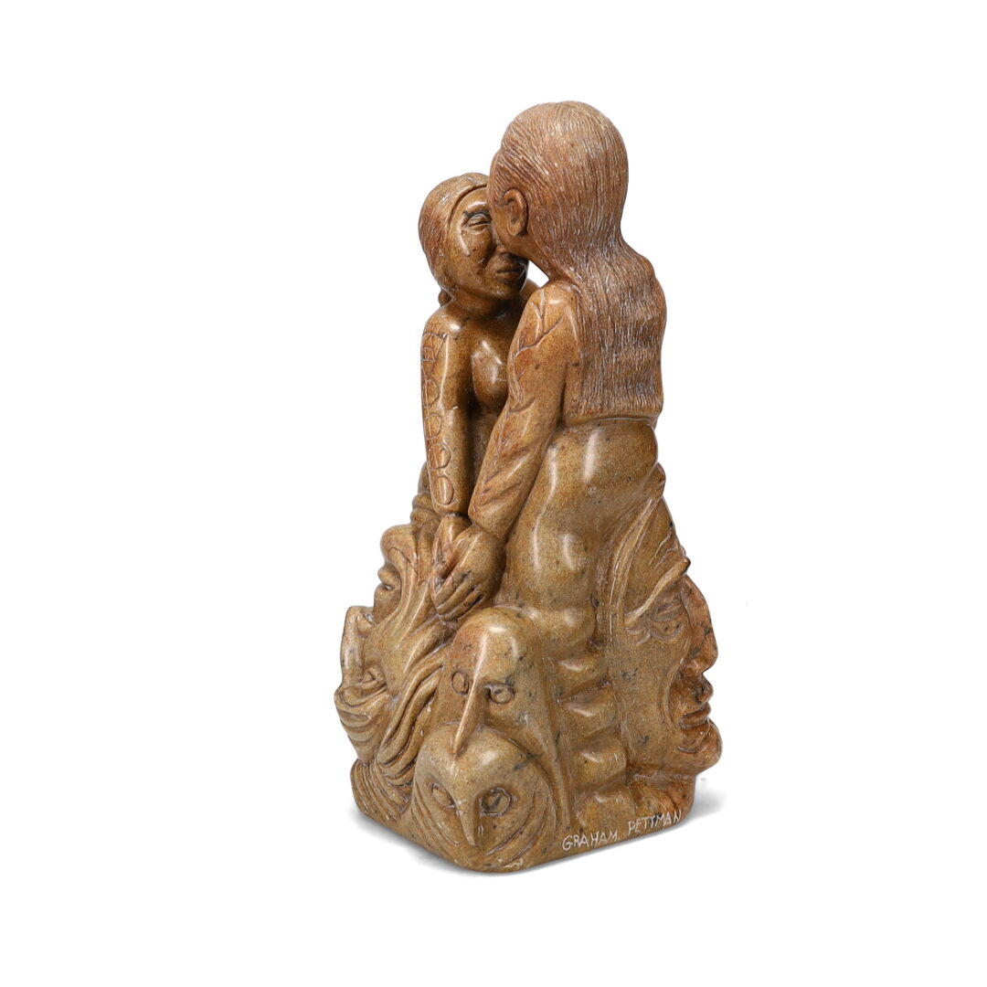 One original hand-carved sculpture by Iroquois artist, Lori Laforme. One couple carved out of soapstone.