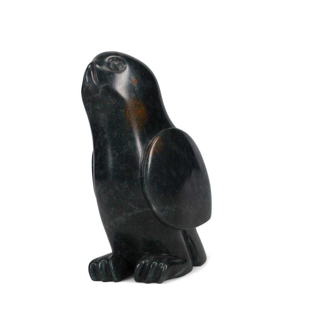 One original hand-carved sculpture by Iroquois artist, Leroy Henry. One owl carved out of soapstone (steatite).