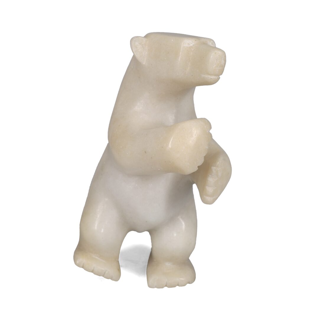 One original hand-carved sculpture by Inuit artist, Otokie Ashoona. One dancing bear carved out of white marble.