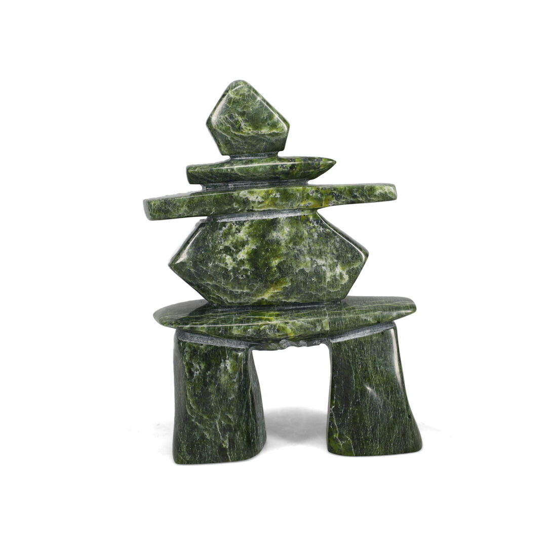 One original hand-carved sculpture by Inuit artist, Sammy Kolola. One Inukshuk carved out of green serpentine stone.
