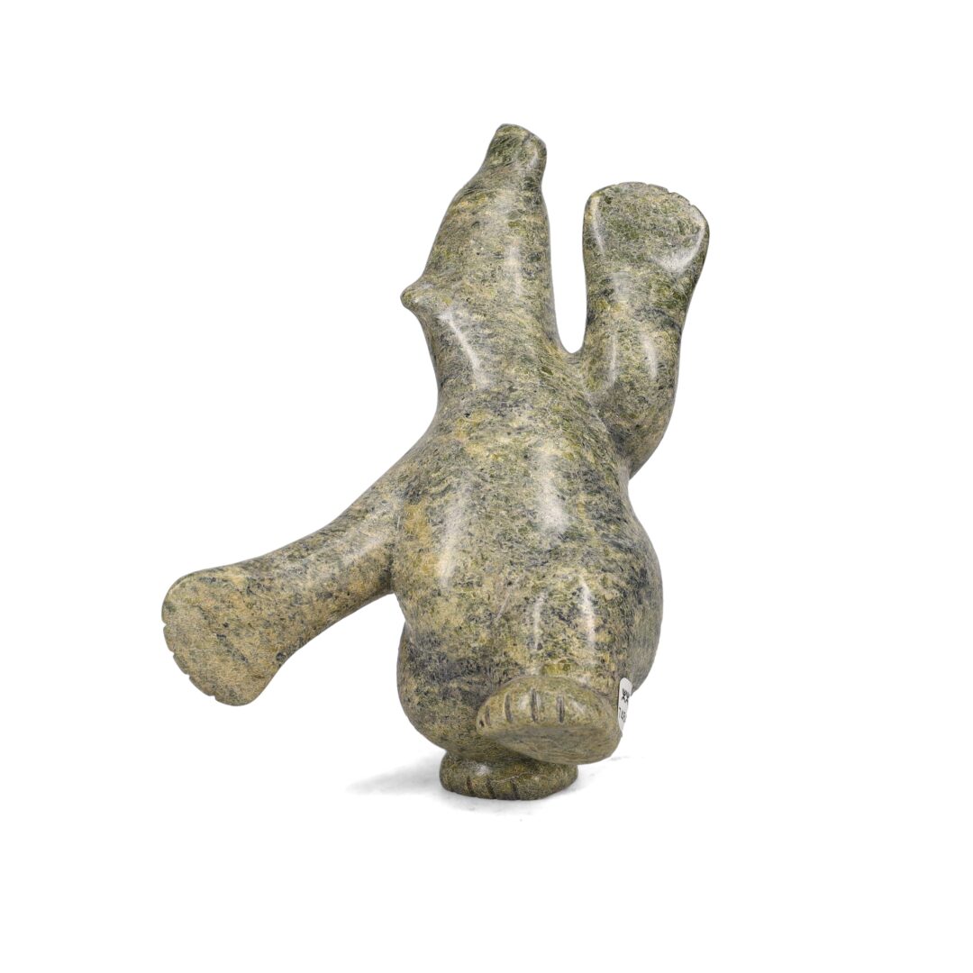 One original hand-carved sculpture by Inuit artist, Markoosie Papigatok. One dancing bear carved out of serpentine.