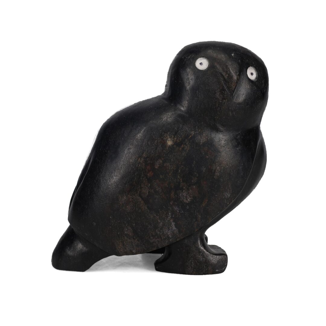 One original hand-carved sculpture by Inuit artist, Kupapik Ningeocheak. One owl carved out of serpentine.
