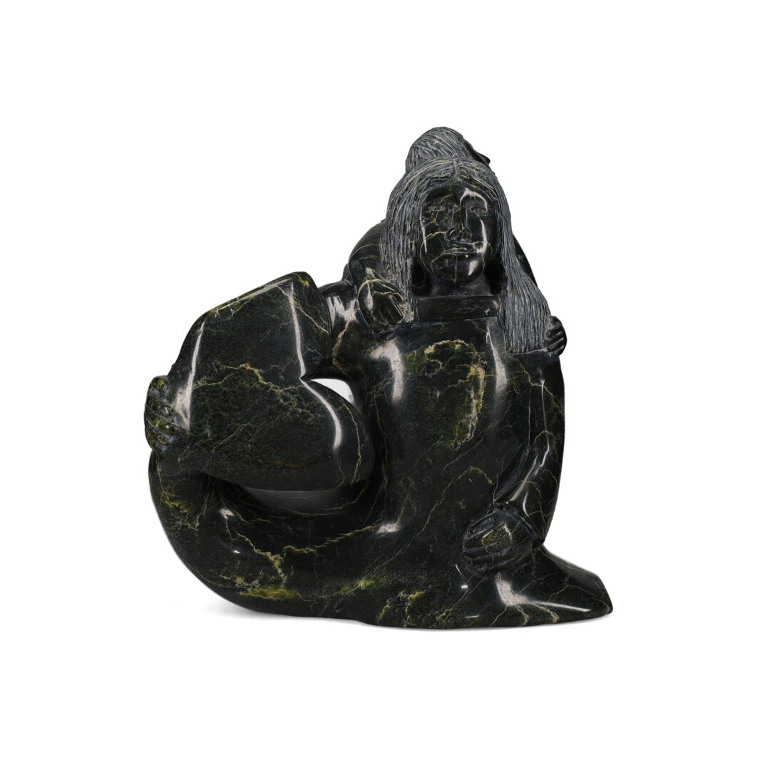 One original hand-carved sculpture by Inuit artist, Pitseolak Niviaqsi. One Sedna and child carved out of serpentine.