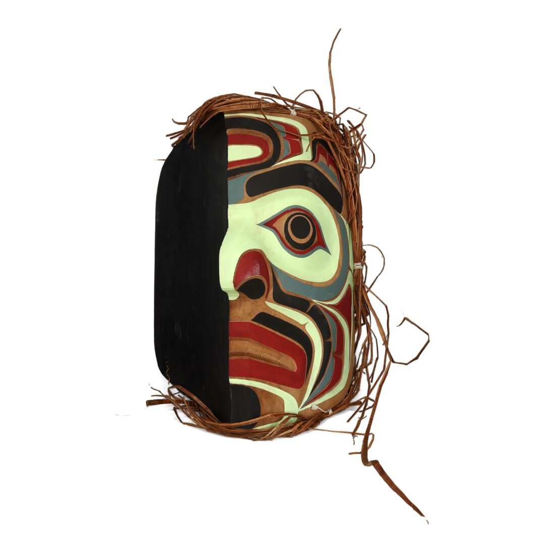 One Original hand-carved Mask by Kenny S. Poglas, from Kingcome Inlet, BC. One reconciliation mask carved out of cedar wood.