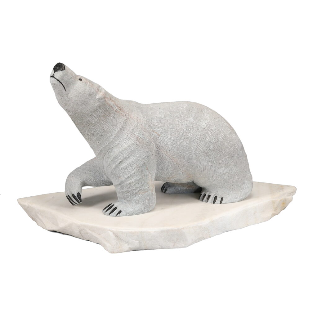 One original hand-carved sculpture by Inuit Oneida artist, Eric Silver carved out of soapstone, depicting a polar bear