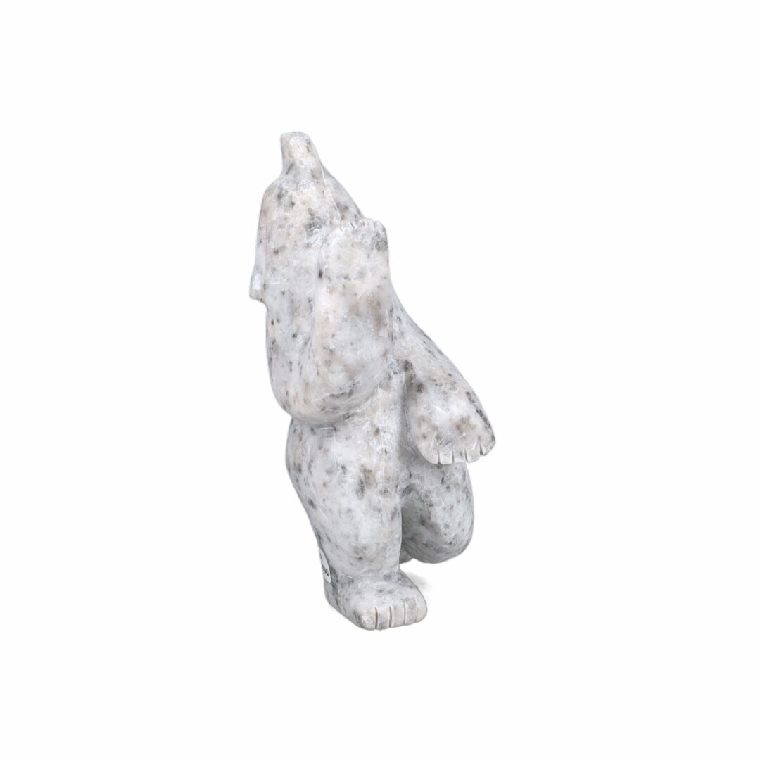 One original hand-carved sculpture by Inuit artist, Palaya Qiatsuq. One dancing bear carved out of white marble.
