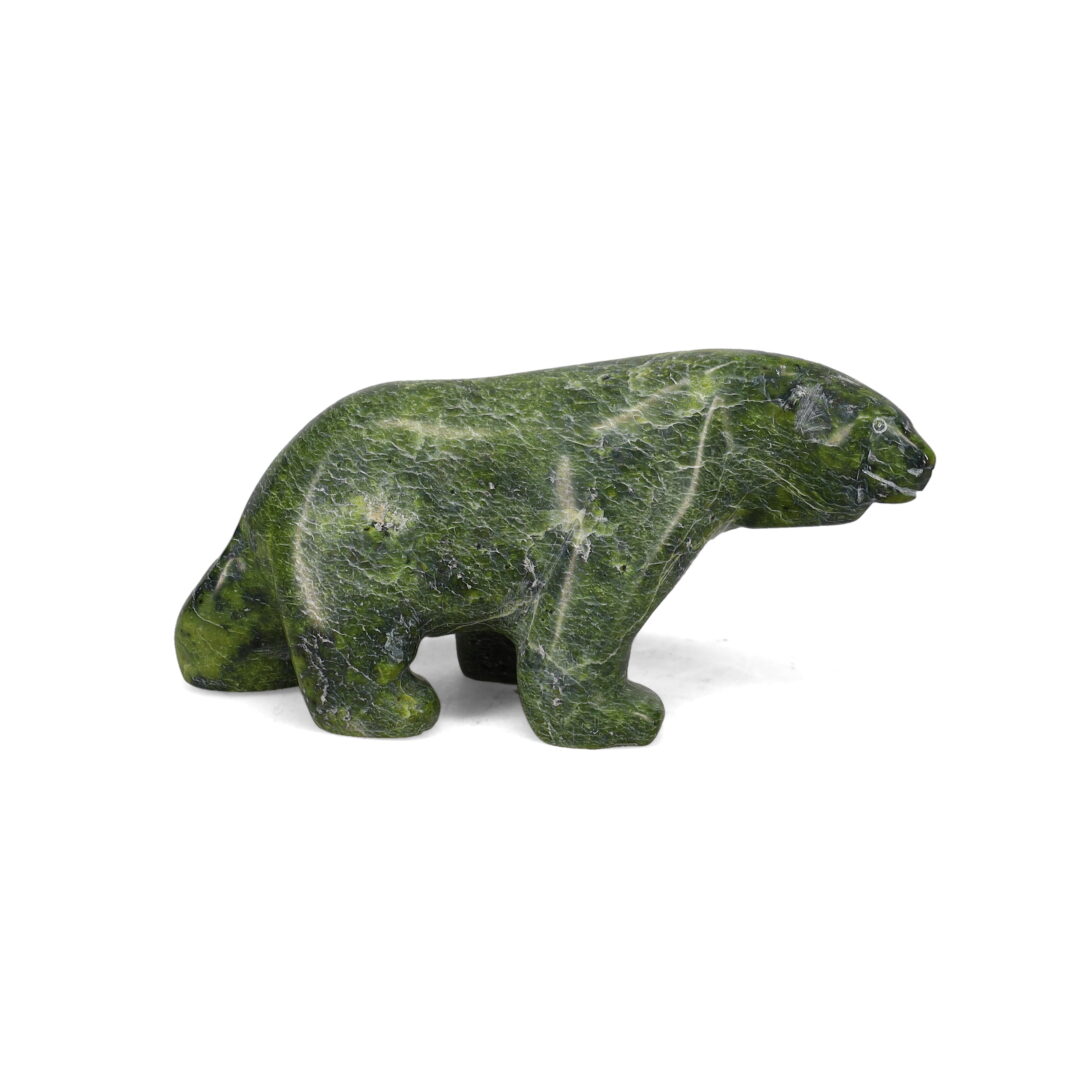 One original hand-carved sculpture by Inuit artist, Simeonie Killiktee. One bear carved out of serpentine.