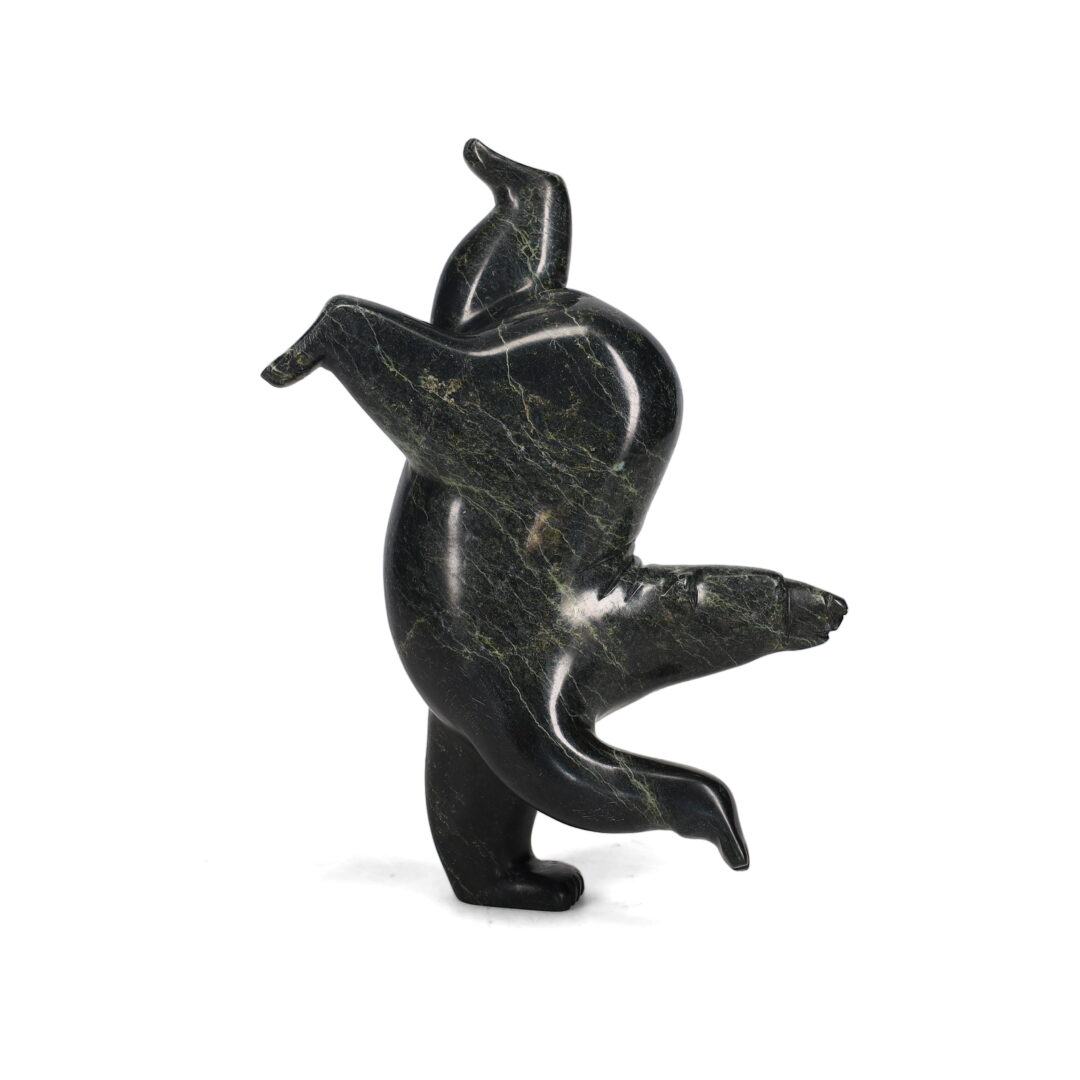 One original hand-carved sculpture by Inuit artist, Timothy Pee. One dancing bear carved out of serpentine.