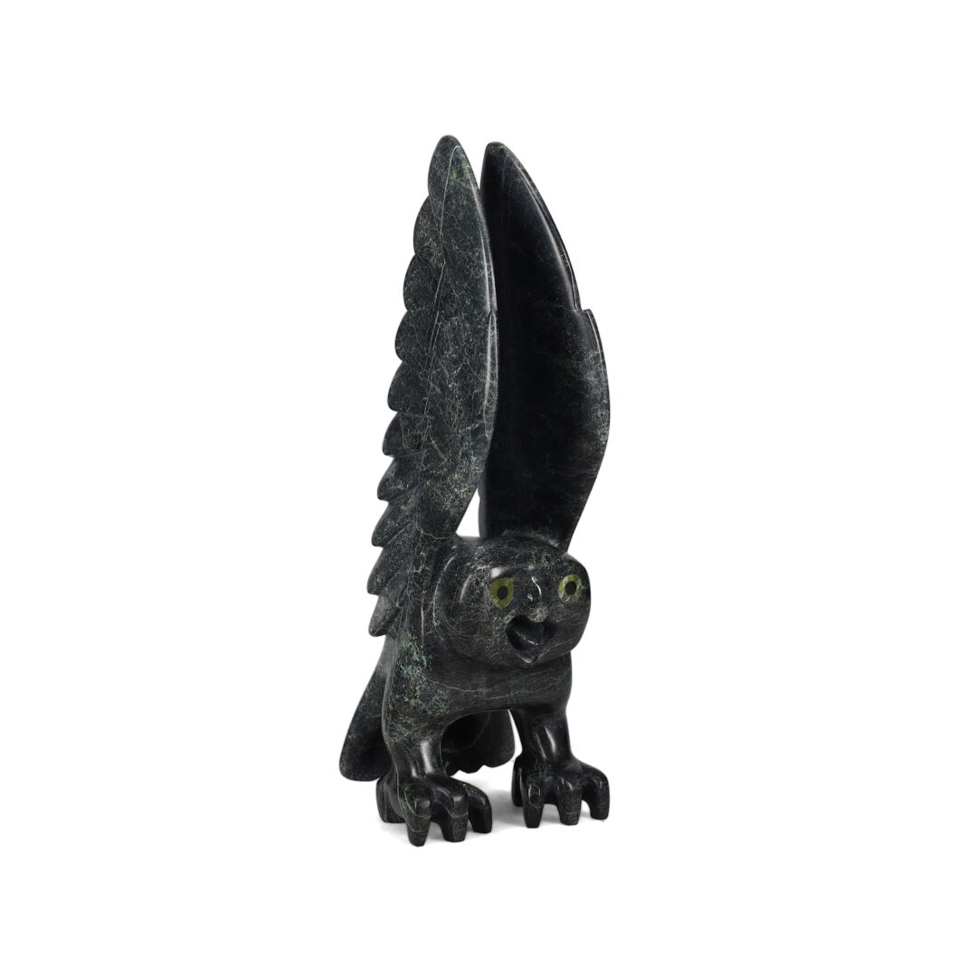 One original hand-carved sculpture by Inuit artist, Toonoo Sharky. One owl carved out of serpentine stone.