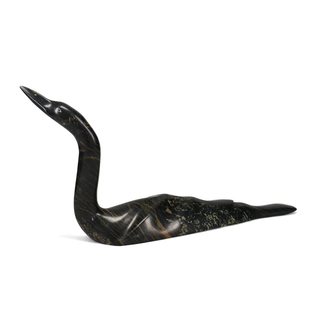 One original hand-carved sculpture by Inuit artist, Ningeosiak Ashoona. One loon carved out of serpentine.