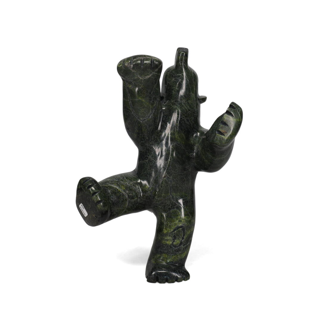 One original hand-carved sculpture by Inuit artist, Matt Kingwatsiaq. One dancing bear carved out of serpentine.