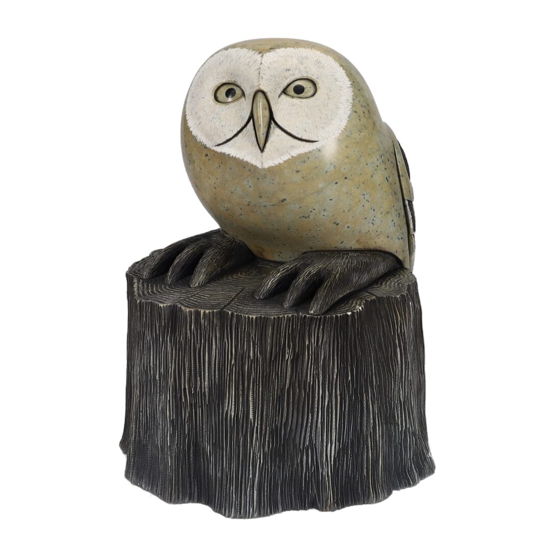 One original hand-carved sculpture by Iroquois artist, Cyril Henry. One owl on a stump carved out of soapstone.