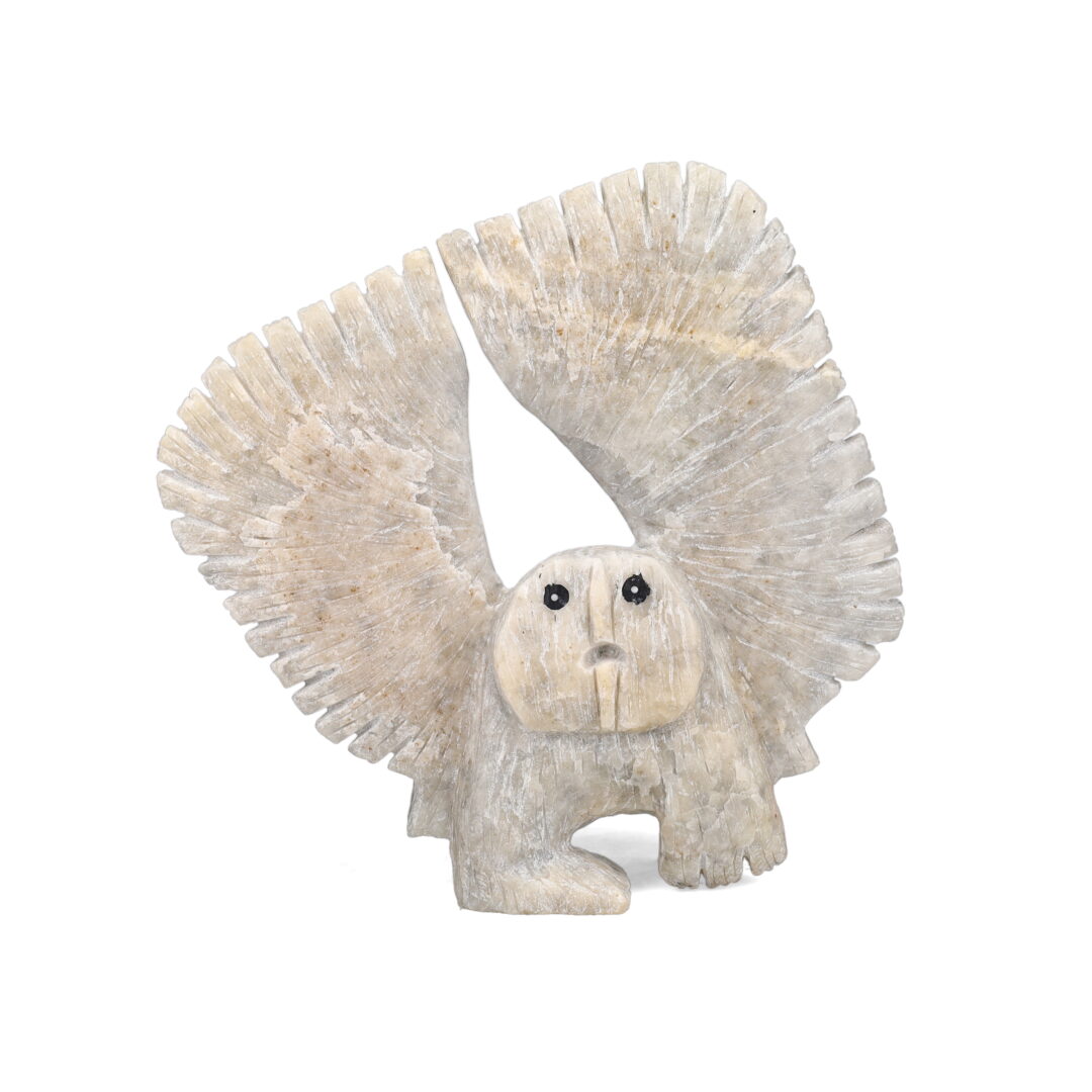 One original hand-carved sculpture by Inuit artist, Palaya Qiatsuk. One dancing owl carved out of marble and serpentine.