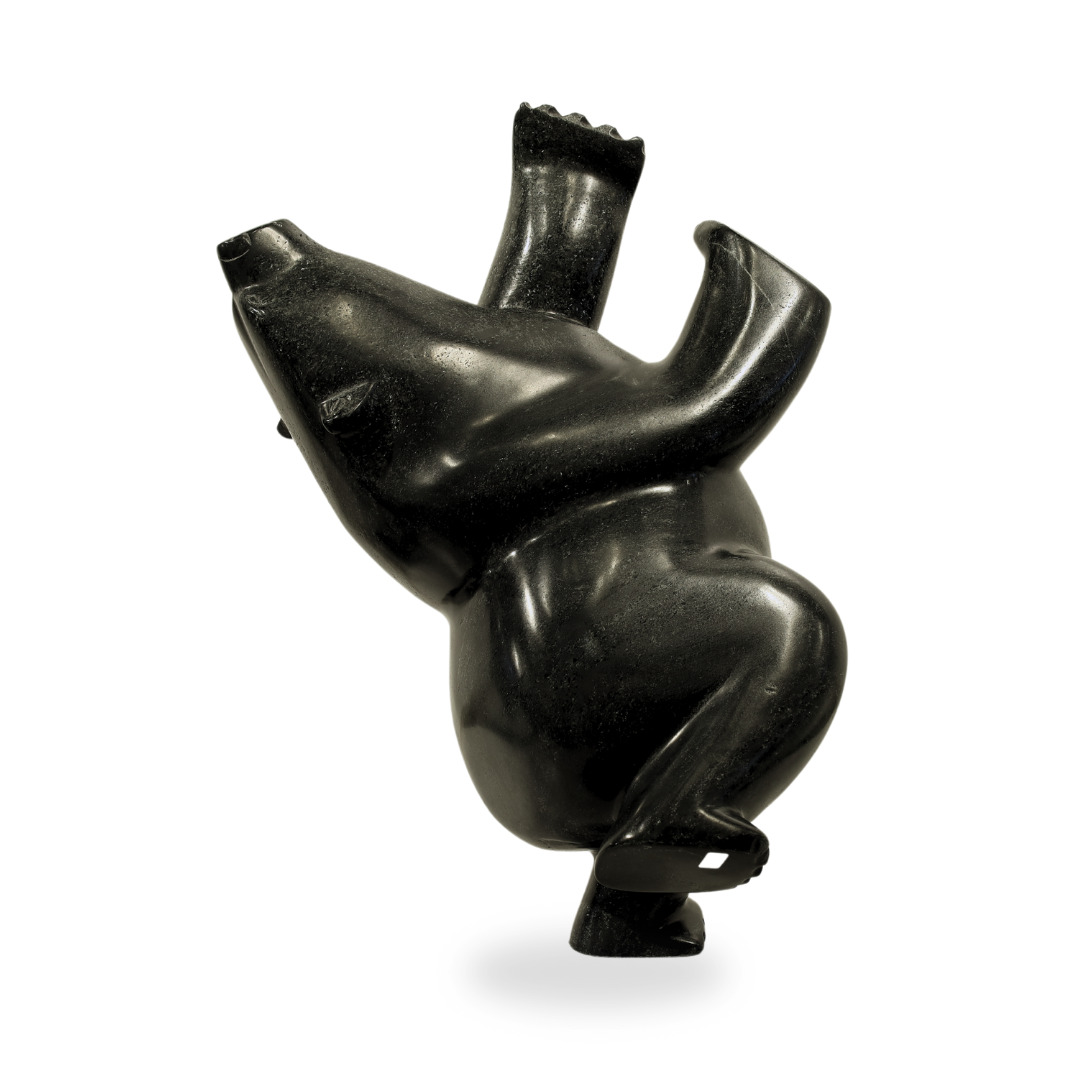 One original hand-carved sculpture by Inuit artist, Killiktee Killiktee. One dancing bear carved out of serpentine.