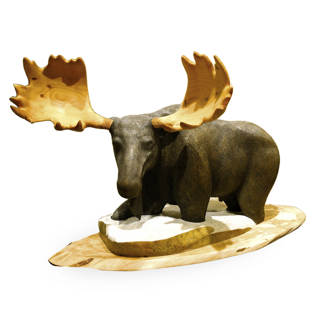 One original hand-carved sculpture by Iroquois artist, Eric Silver. One Moose carved out of soapstone, and wood accents.