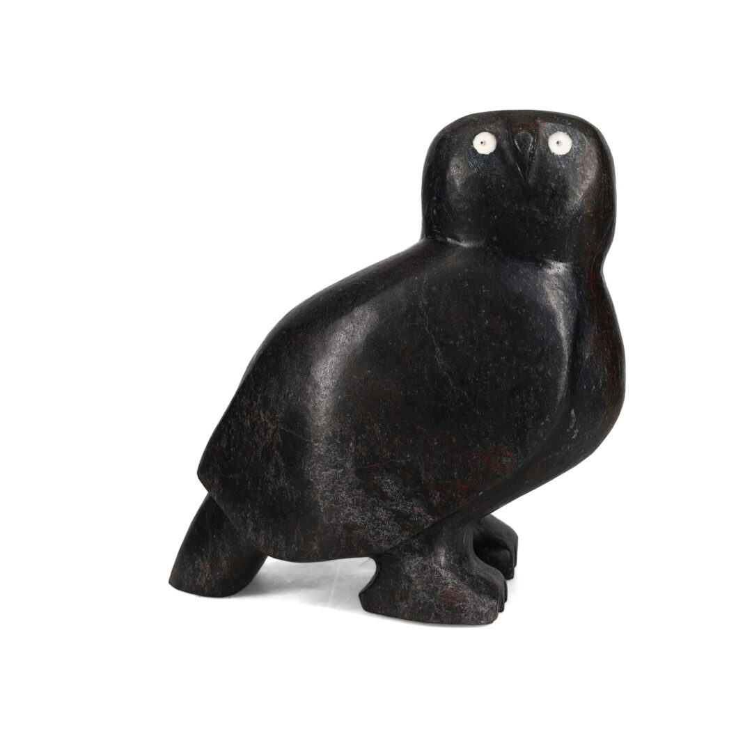 One original hand-carved sculpture by Inuit artist, Kupapik Ningeocheak. One owl carved out of basalt stone.