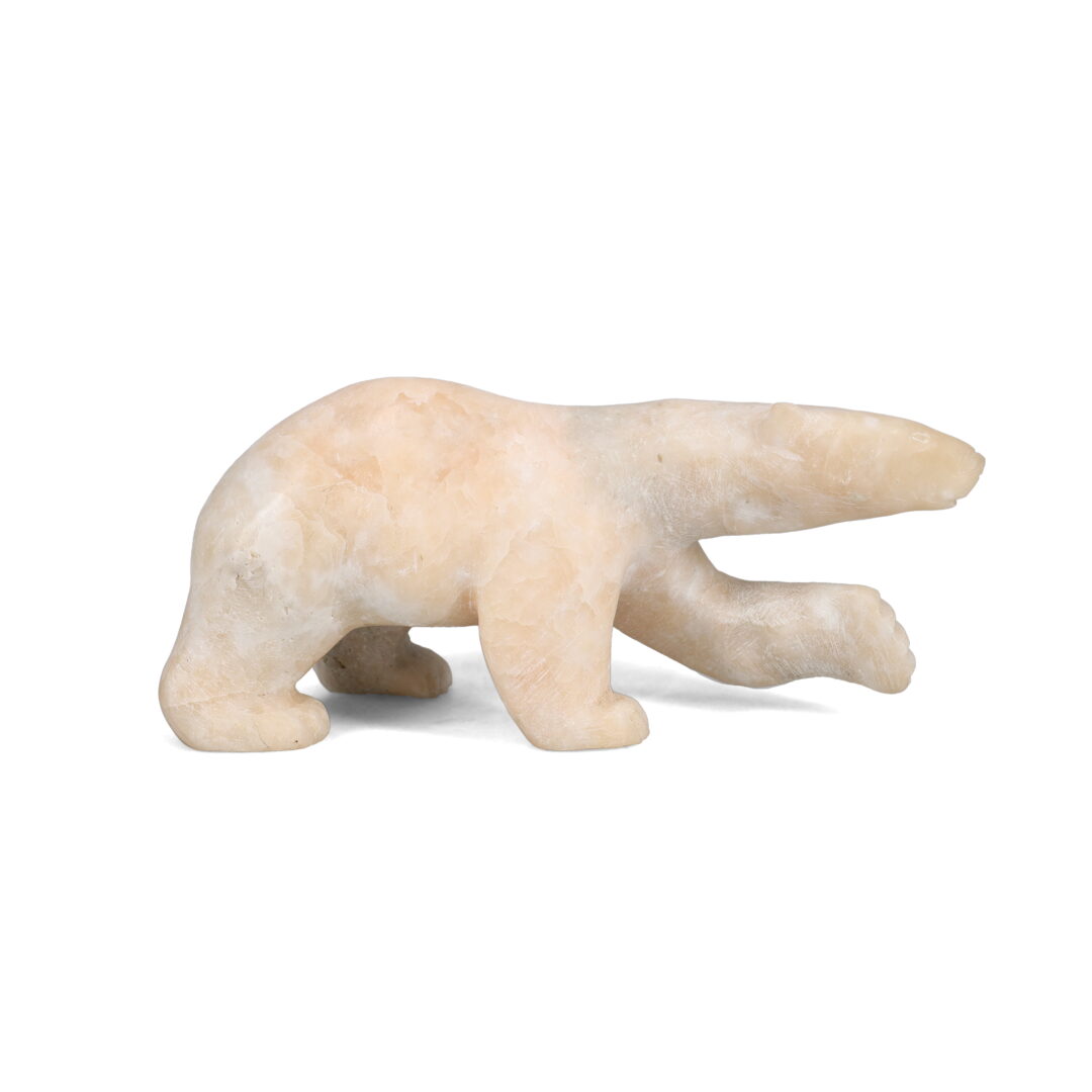 One original hand-carved sculpture by Inuit artist, Quaraq Nungusuitok. One bear carved out of white marble.