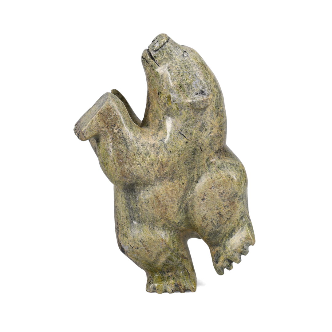 One original hand-carved sculpture by Inuit artist, Samonie Shaa. One dancing bear carved out of serpentine.