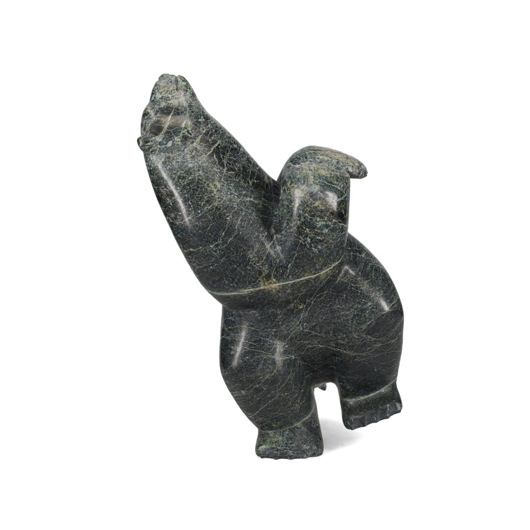 One original hand-carved sculpture by Inuit artist, Isaaci Petaulassie. One dancing bear carved out of serpentine.