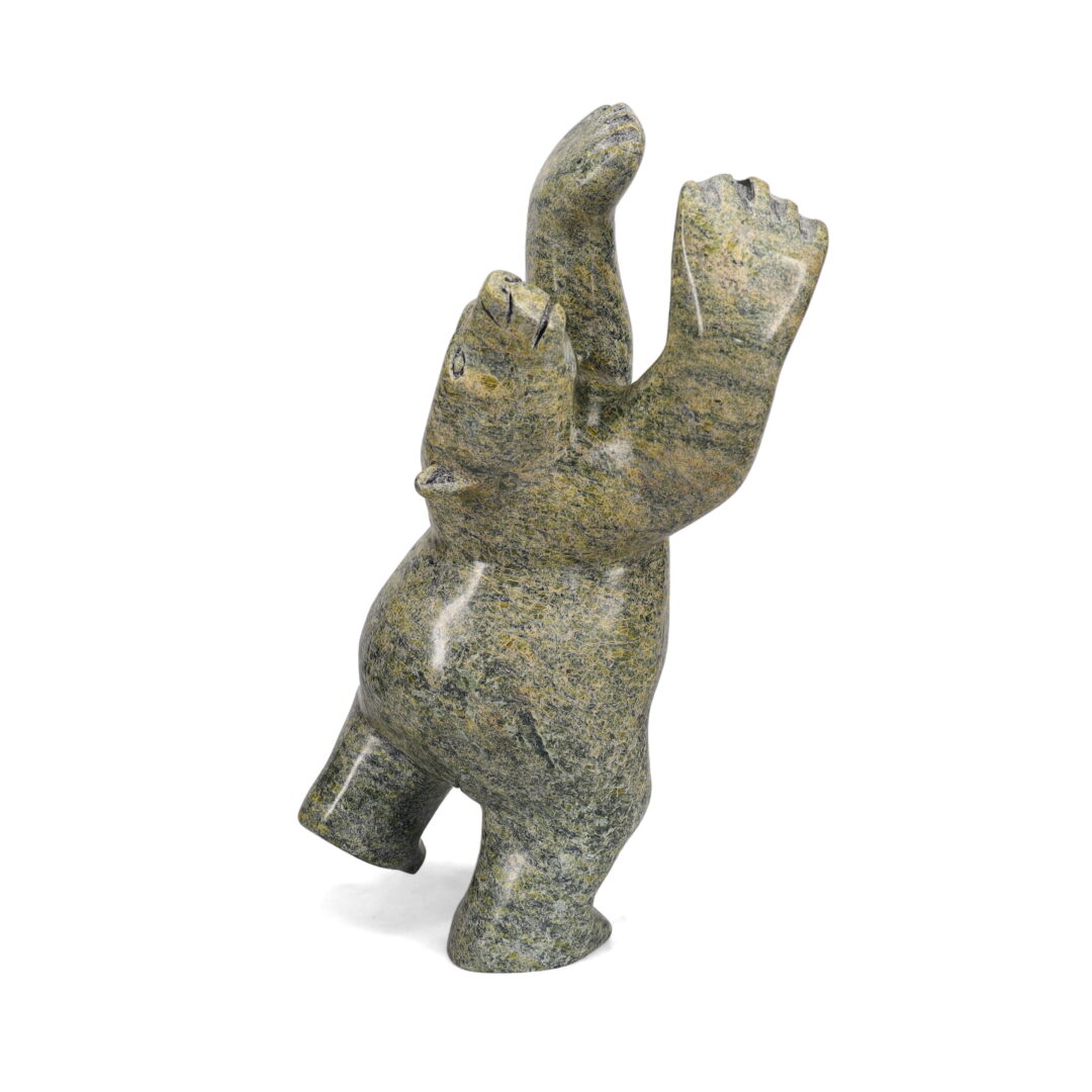 One original hand-carved sculpture by Inuit artist, Johnny Lee Pudlat. One dancing bear carved out of serpentine.