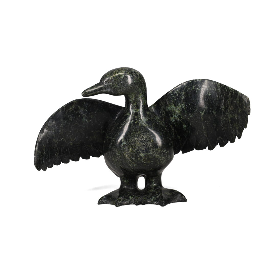 One original hand-carved sculpture by Inuit artist, Pudlalik Shaa. One standing bird carved out of serpentine.