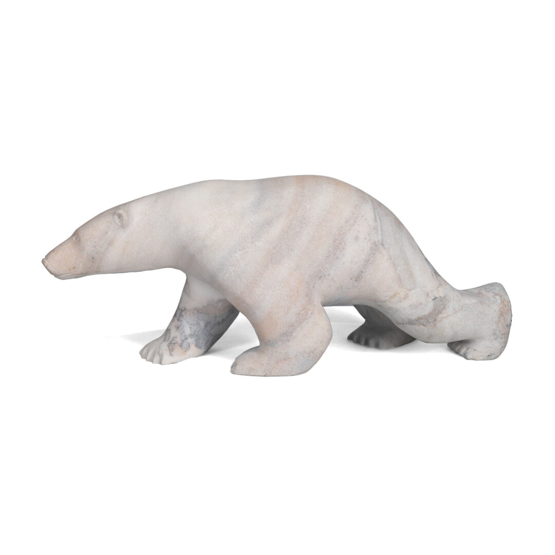 One original hand-carved sculpture by Inuit artist, Koomatuk Sapa Curley. One walking bear carved out of alabaster.